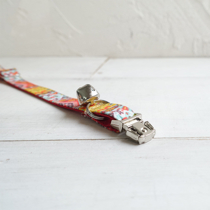 Adjustable pet collar with bell