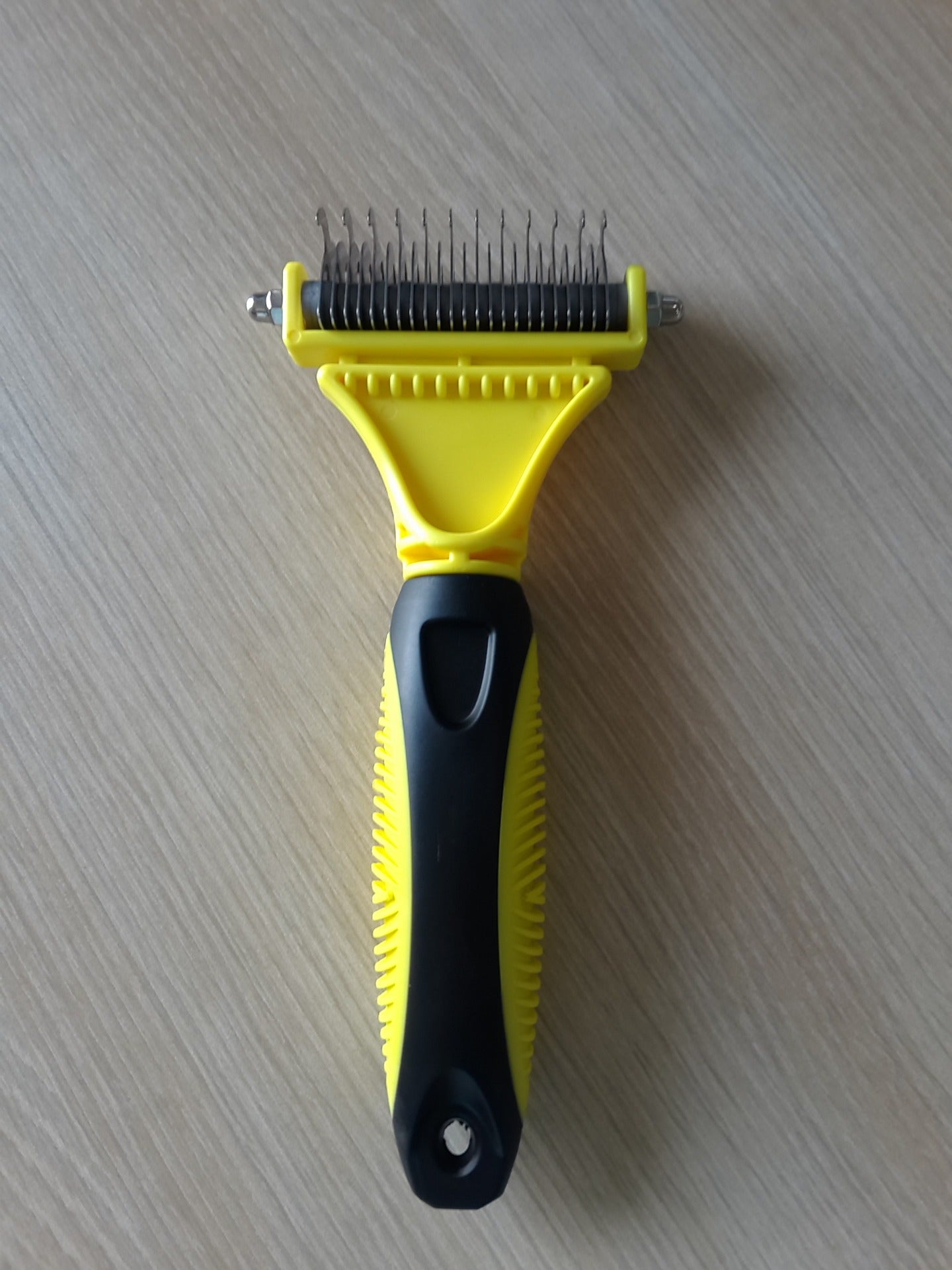 Stainless steel double-sided knot comb
